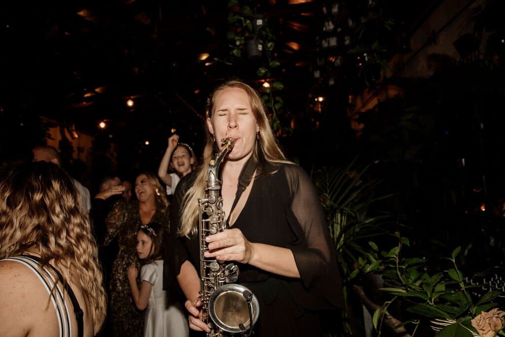 Female Sax Player At Glasshaus Inside Melbourne