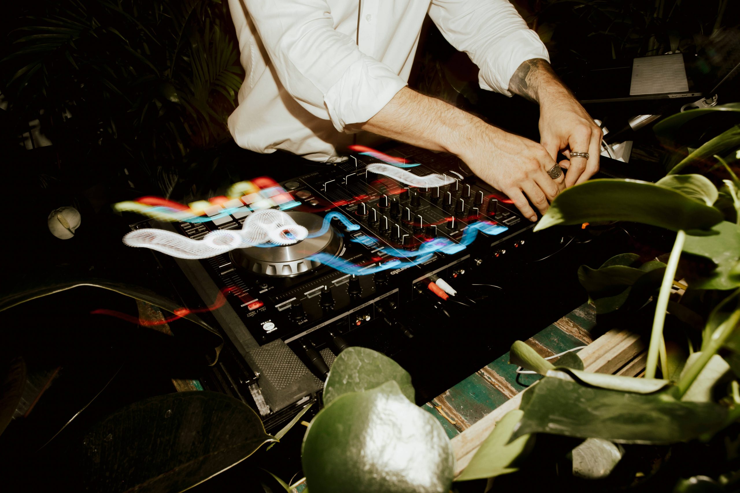 Wedding DJ On DJ Mixer At Glasshaus Inside Melbourne