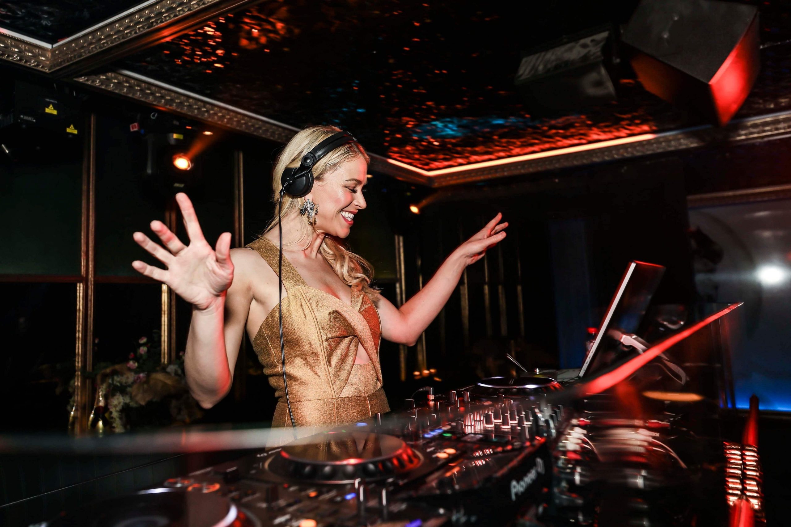 DJ Emma Behind Decks At Event