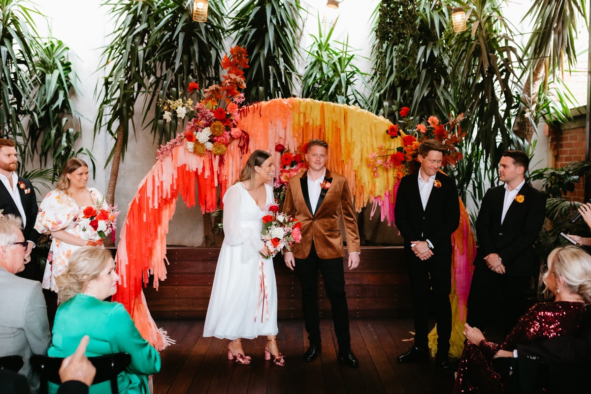 Bride And Groom At Colourful Wedding Ceremony At Post Office Hotel Photographed By Miranda Stokkel