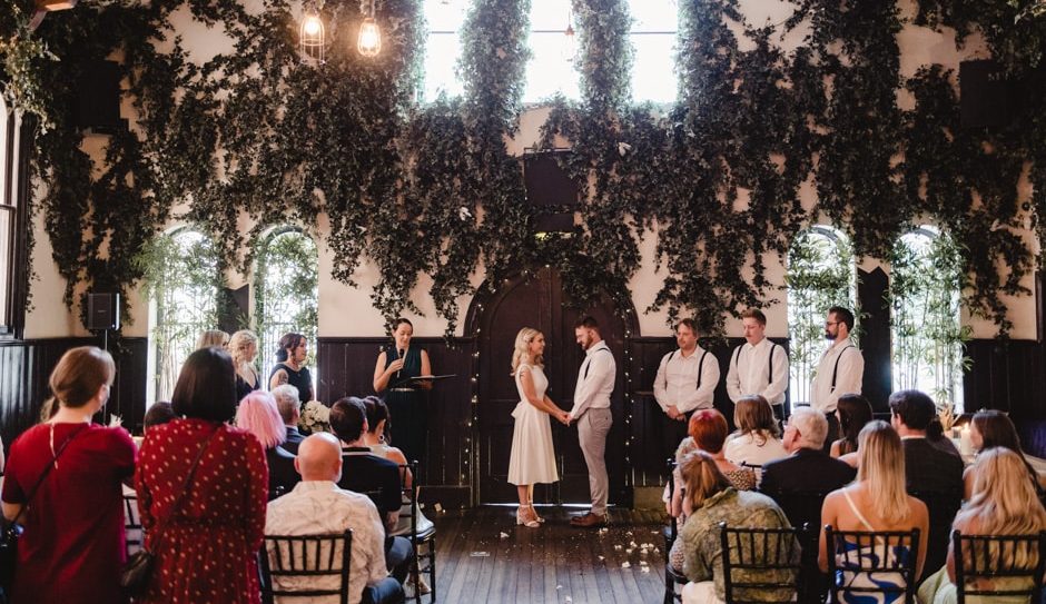Bride and Groom at Wedding Ceremony at Brunswick Mess Hall Photographed by TOne Image
