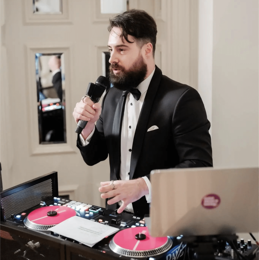 Wedding MC and DJ Eddy Mac from One More Song at Quat Quatta Photographed by Jerome Cole